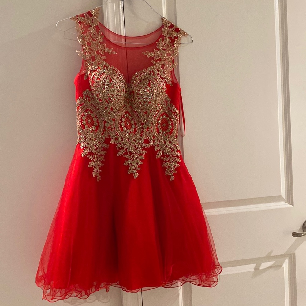 Red and gold sparkle dress